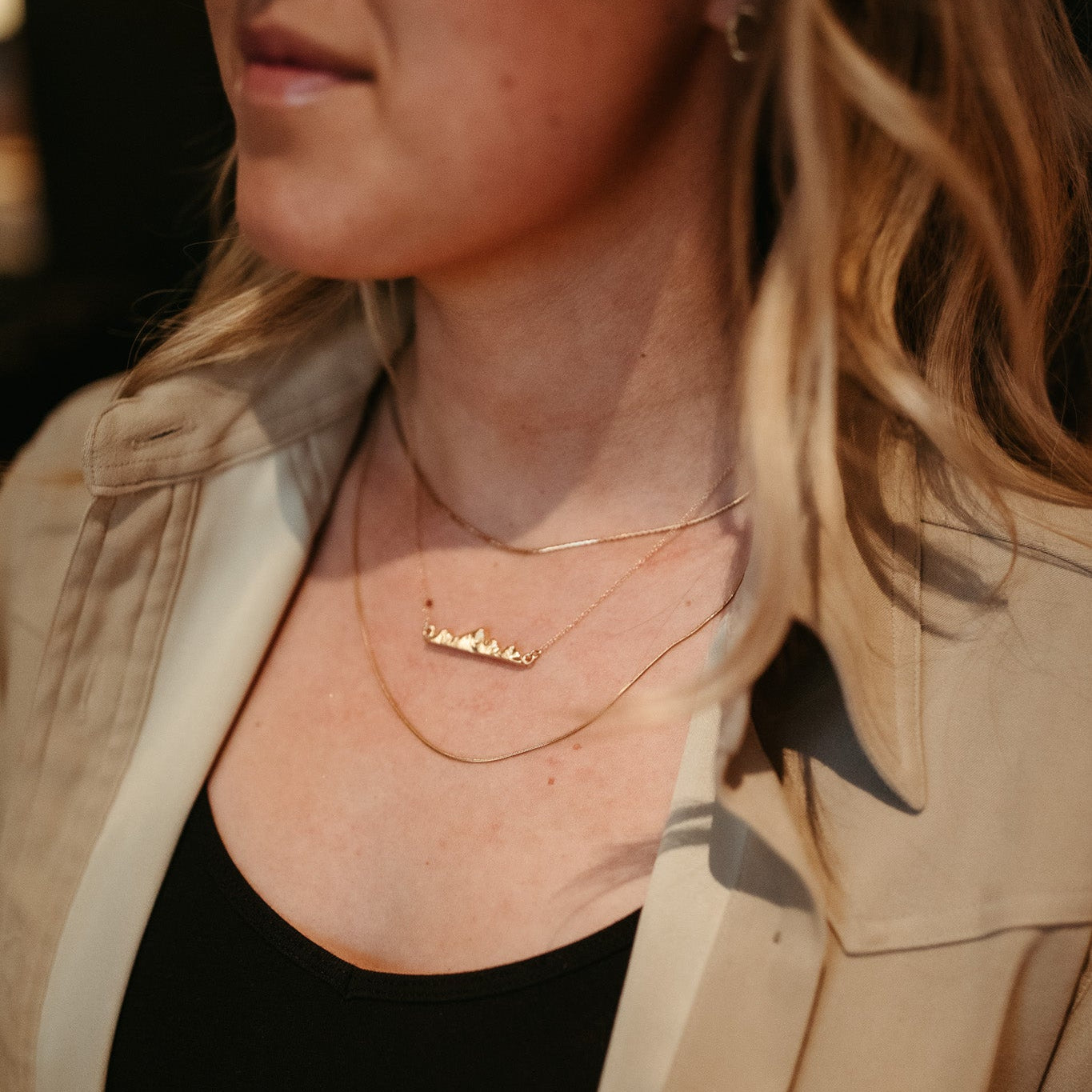 Gold vermeil Teton II necklace layered with other jewelry