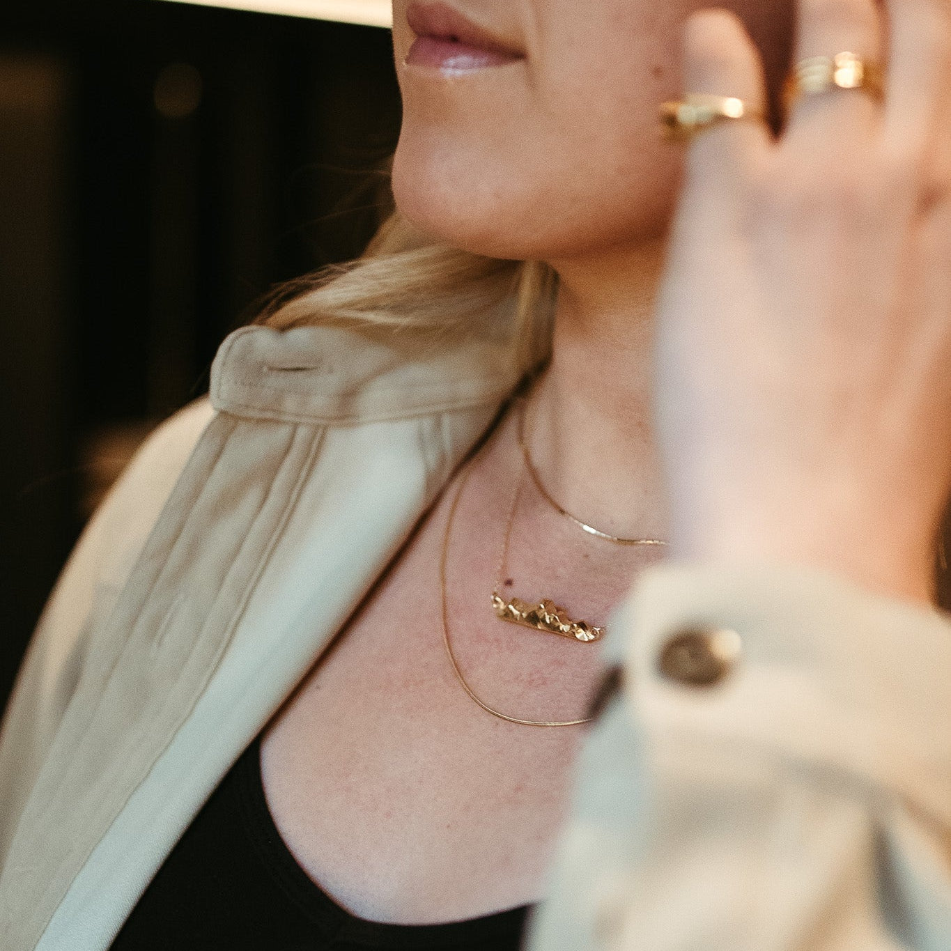 Gold vermeil Teton II necklace layered with other jewelry