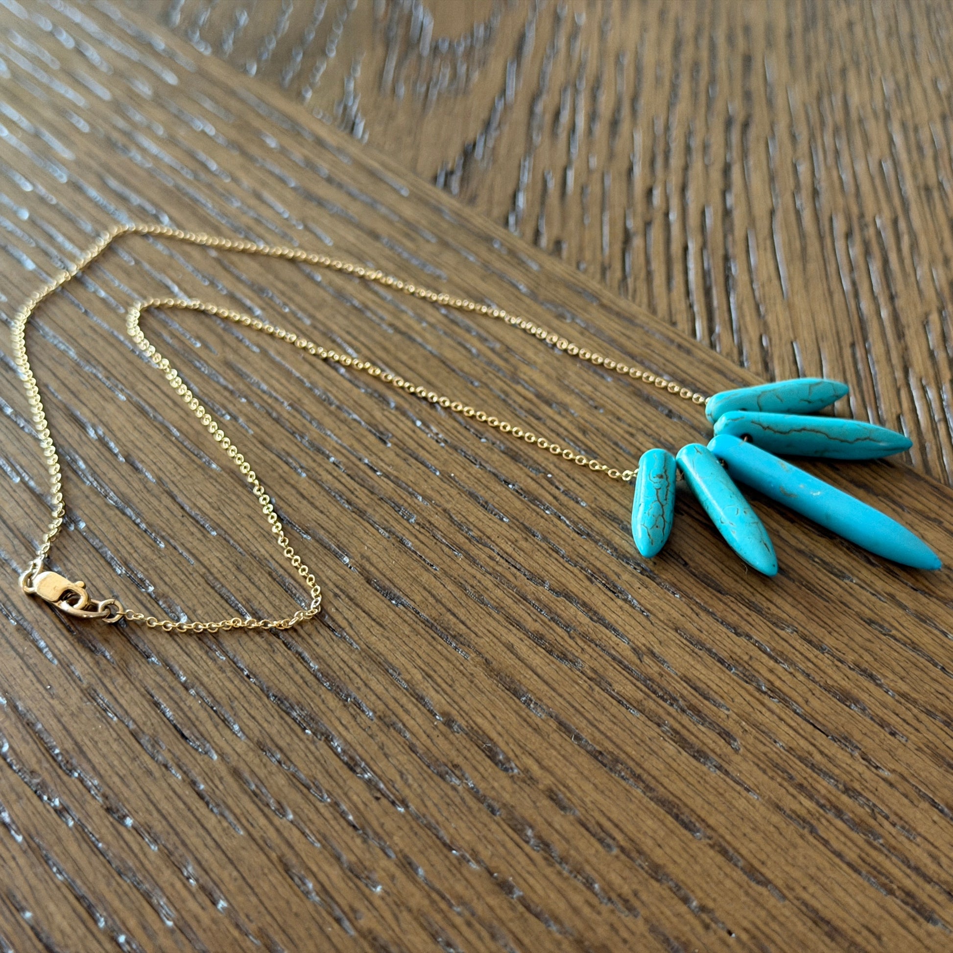 Turquoise Howlite spike necklace with five graduated stones on 14k gold-filled chain, handcrafted in Jackson Hole Wyoming